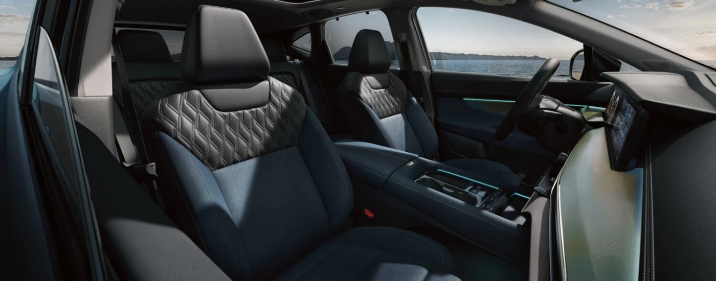 A blue 2026 Nissan Murano from the passenger side.