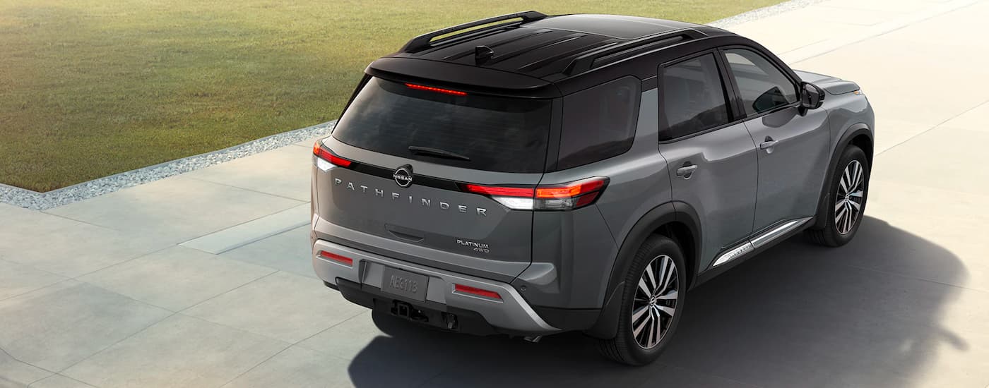High angle rear view of a grey 2023 Nissan Pathfinder Platinum.