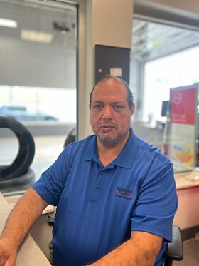 Staff member Chris Martinez from ID_259ea431d61e