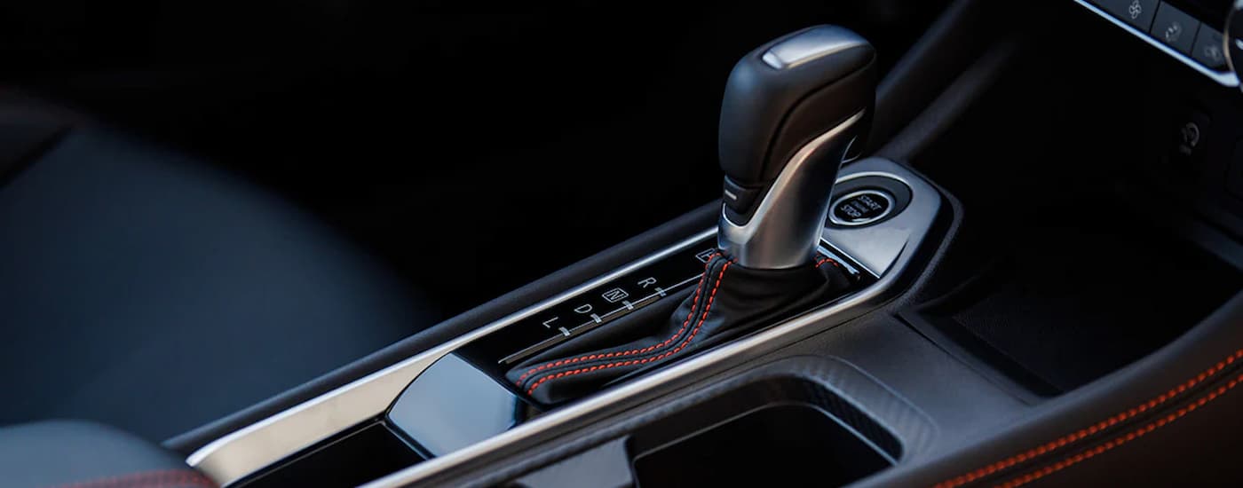 The center console and shifter in a 2024 Nissan Sentra.