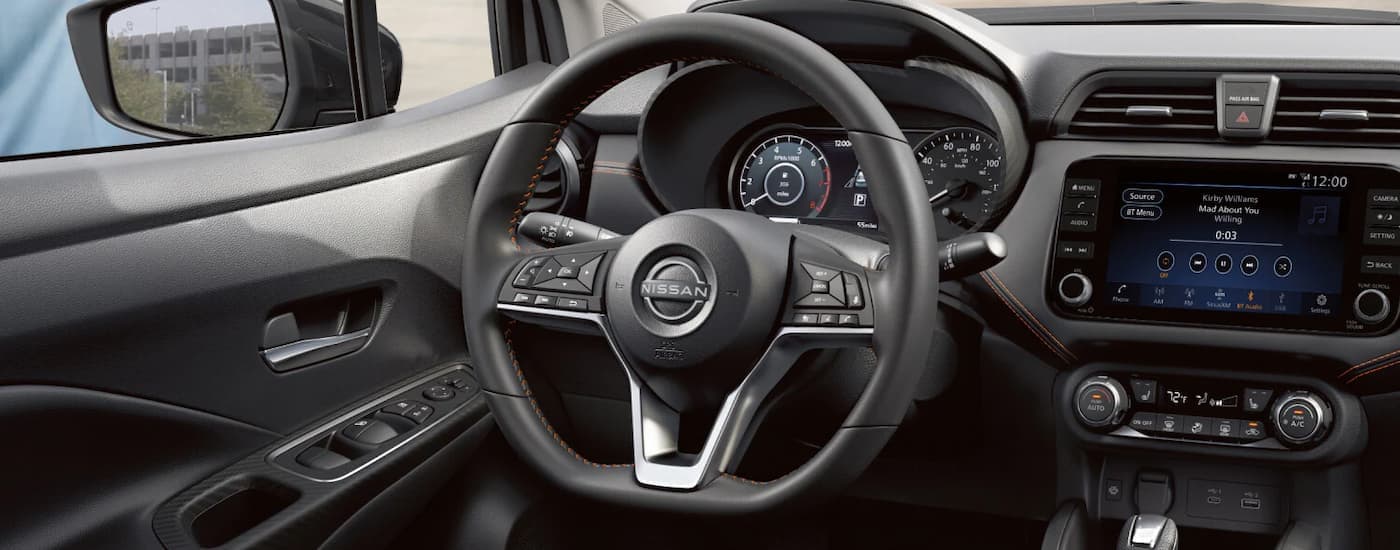 Steering wheel and dashboard inside a 2025 Nissan Versa