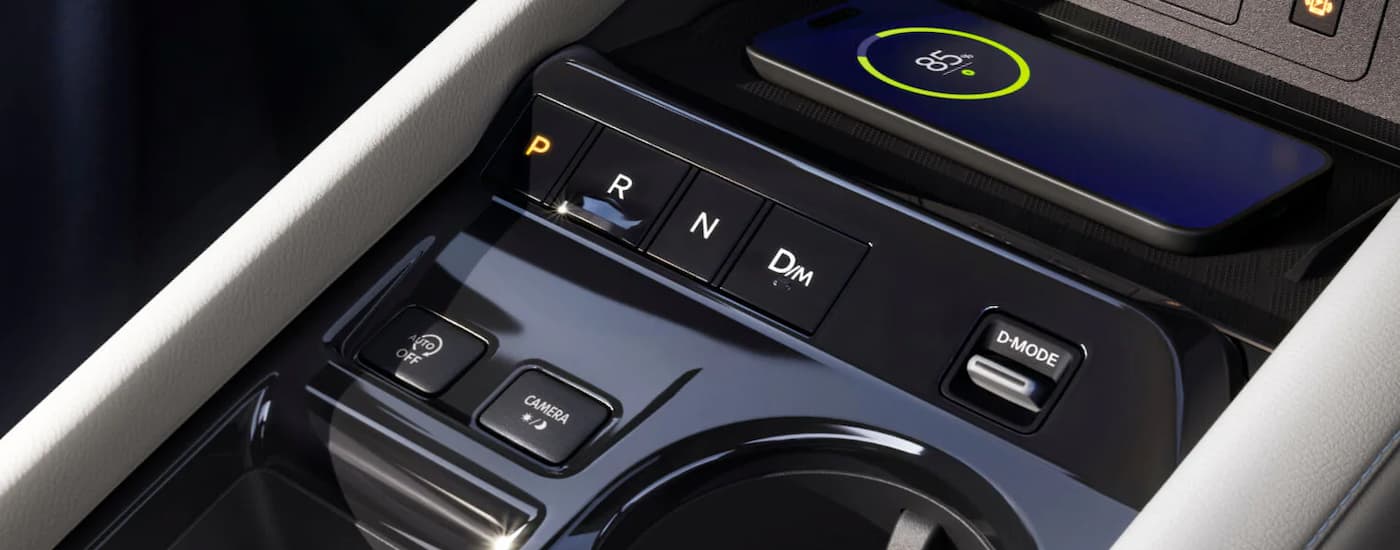 Center console and phone charging station in a 2025 Nissan Murano Platinum