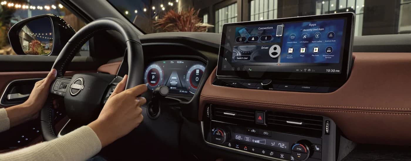 The black and brown interior and dash in a 2026 Nissan Rogue.