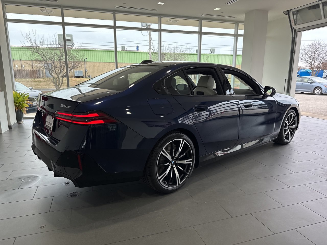 2026 BMW 5 Series 550e - Photo 8
