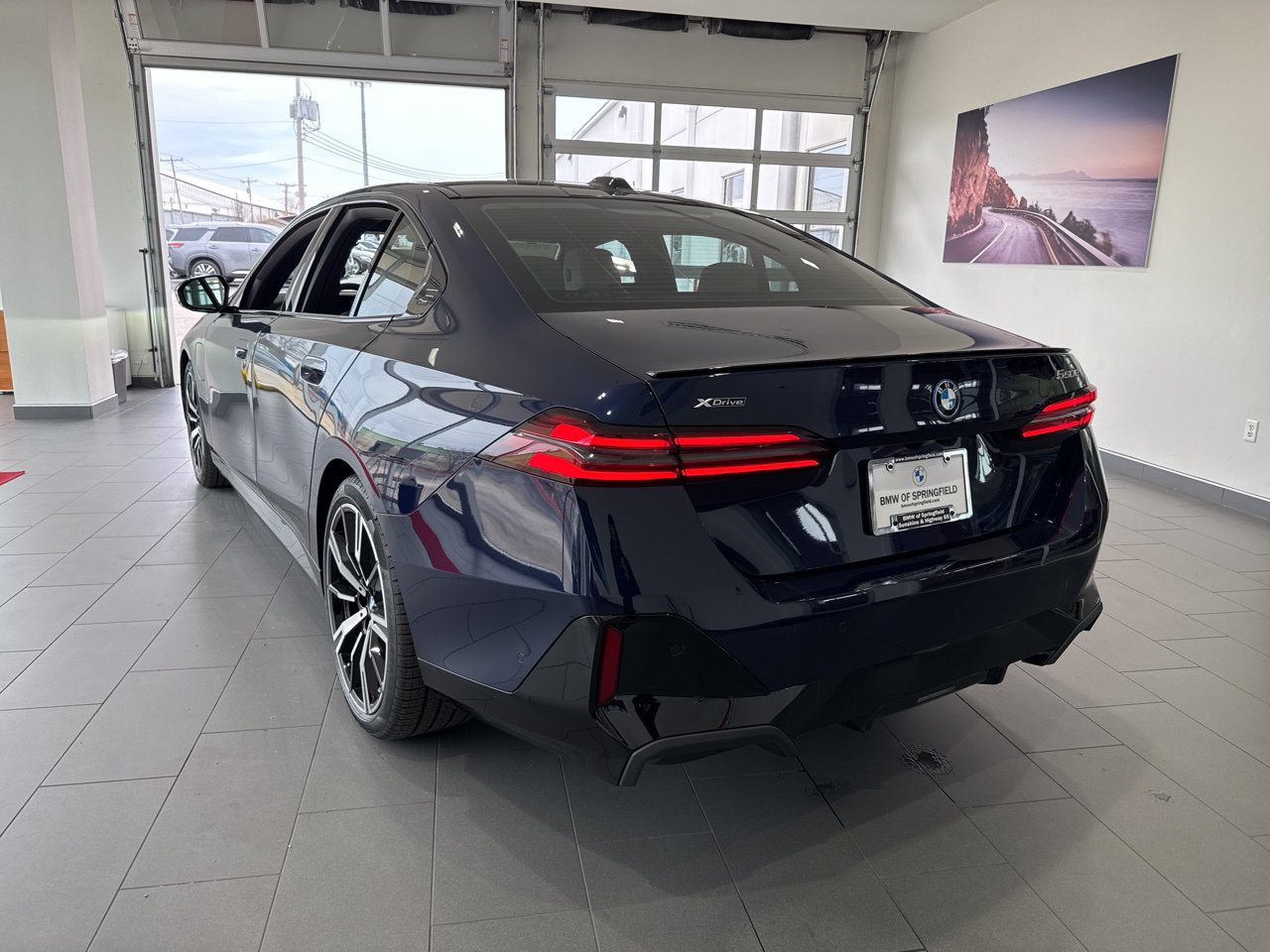 2026 BMW 5 Series 550e - Photo 6