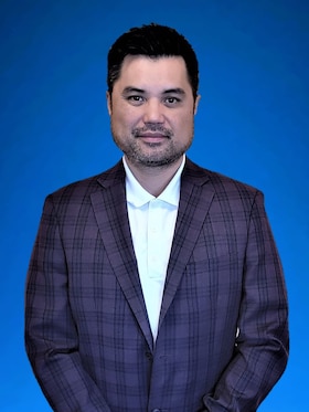 Staff member Jason Gonong from ID_4ed1b15f86c0