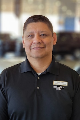 Staff member Mario Perez from ID_83ea9923f874