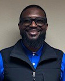 Staff member Cornelius Hill from ID_3bddc3f67193