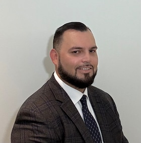 Staff member Anthony Garnica from 6277d54e49cf