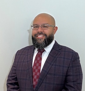 Staff member Yamil Gutierrez from 6277d54e49cf