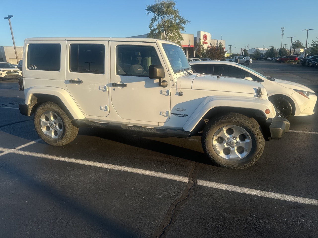 Used 2013 Jeep Wrangler Unlimited Sahara with VIN 1C4HJWEG9DL515057 for sale in Springfield, MO