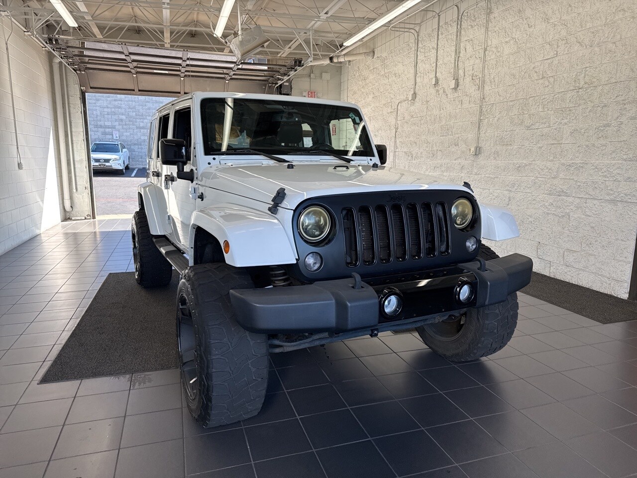 2014 Jeep Wrangler Unlimited Altitude photo 2