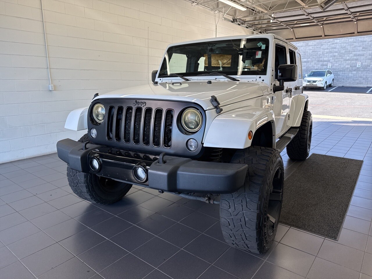 2014 Jeep Wrangler Unlimited Altitude photo 3
