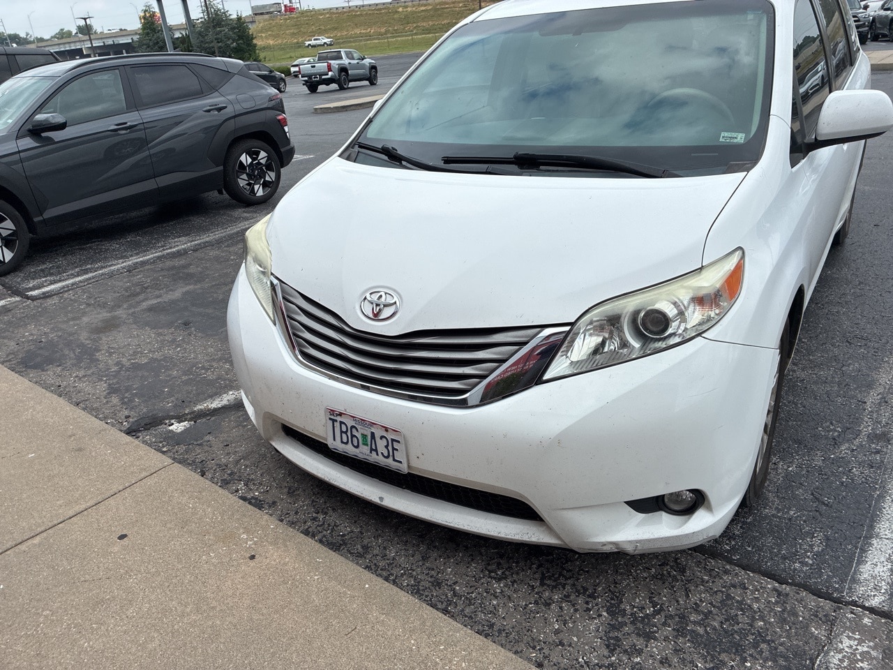 Used 2011 Toyota Sienna XLE with VIN 5TDYK3DC7BS104424 for sale in Springfield, MO