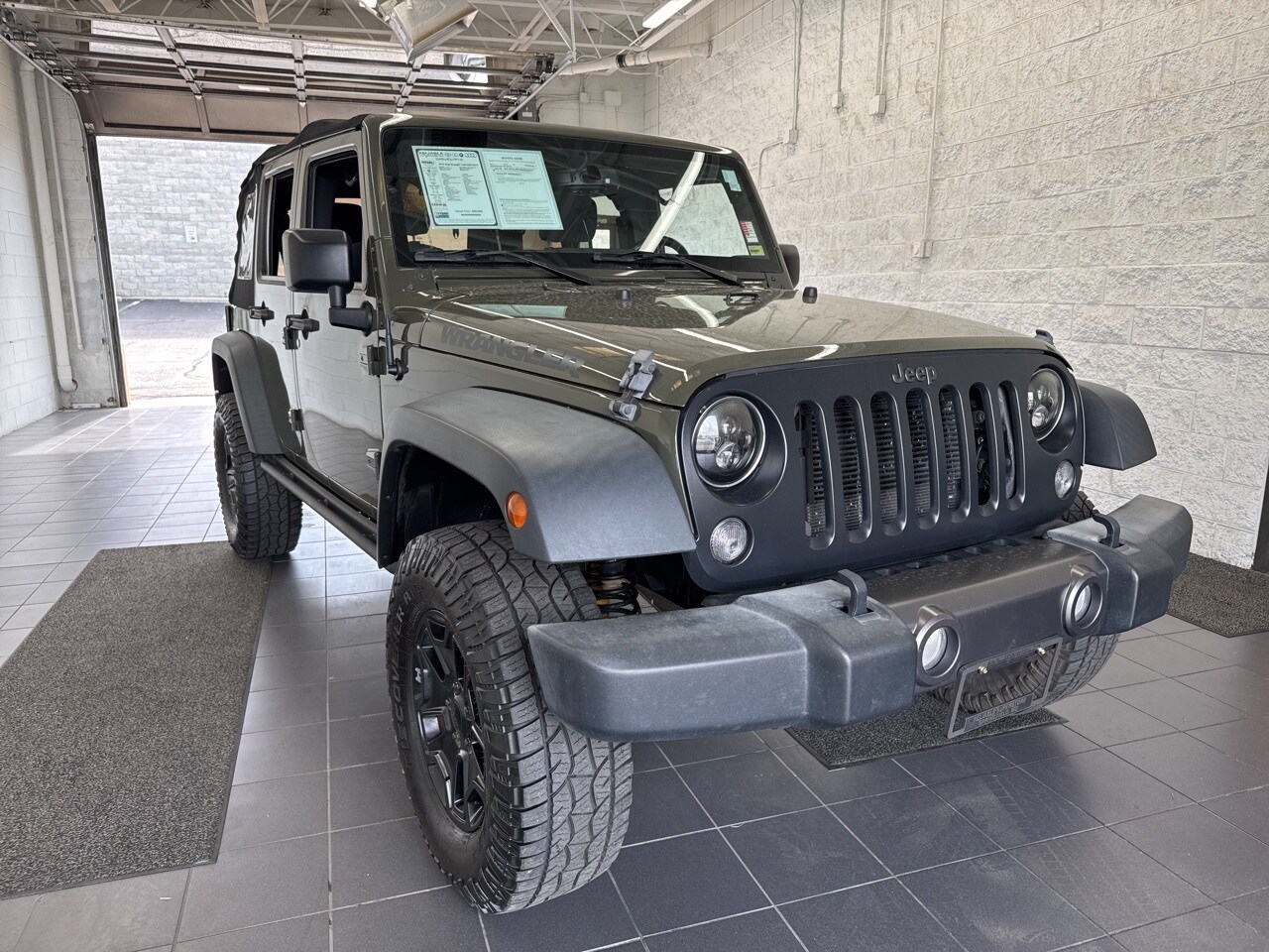 Used 2016 Jeep Wrangler Unlimited Black Bear with VIN 1C4BJWDGXGL130215 for sale in Springfield, MO