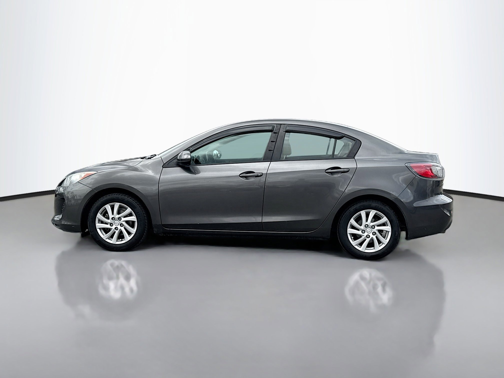 Used 2012 Mazda MAZDA3 i Touring with VIN JM1BL1V84C1577567 for sale in Reno, NV