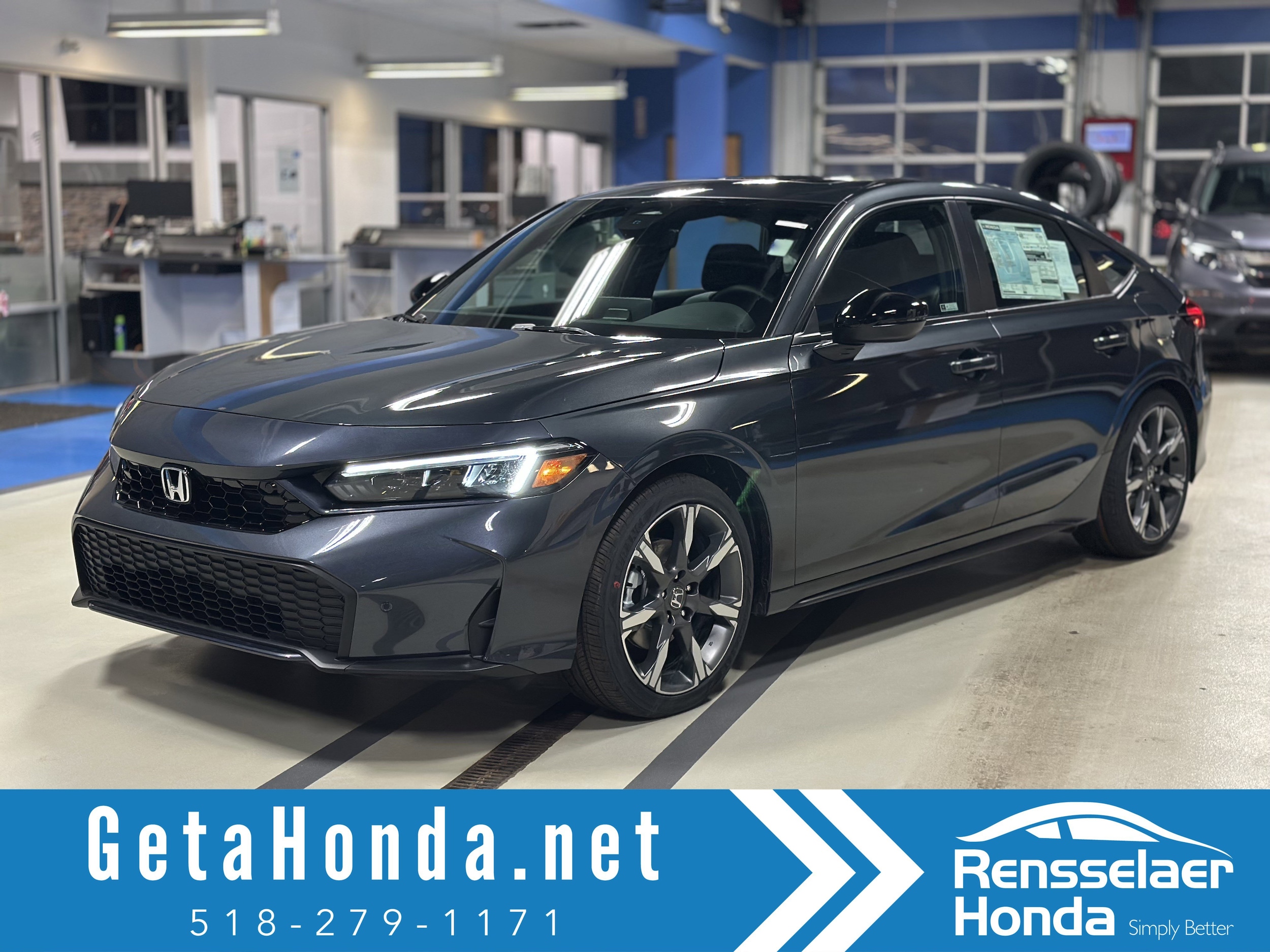 2026 Honda Civic Sport Touring Hybrid CVT's photo