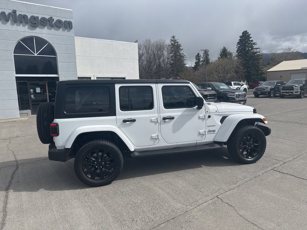 Used 2023 Jeep Wrangler 4xe Sahara 4XE with VIN 1C4JJXP68PW557590 for sale in Livingston, MT