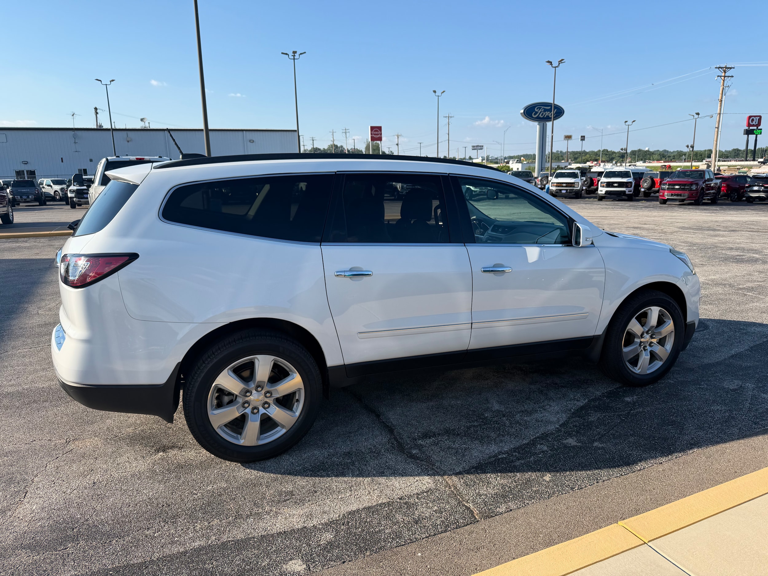 Used 2016 Chevrolet Traverse LTZ with VIN 1GNKRJKD3GJ202220 for sale in Herculaneum, MO