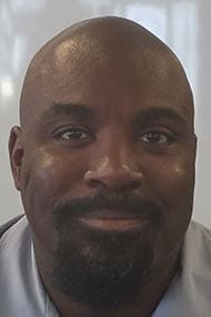 Staff member ENOS PRITCHETT from c4bab9d5d608