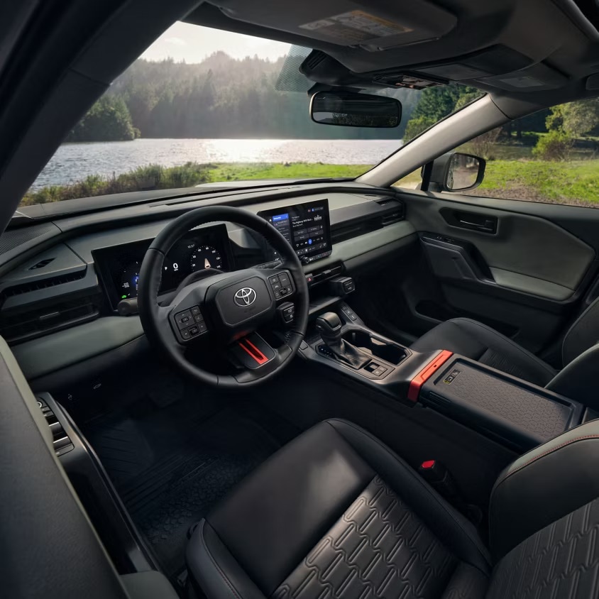  Person cheerfully signing documents.