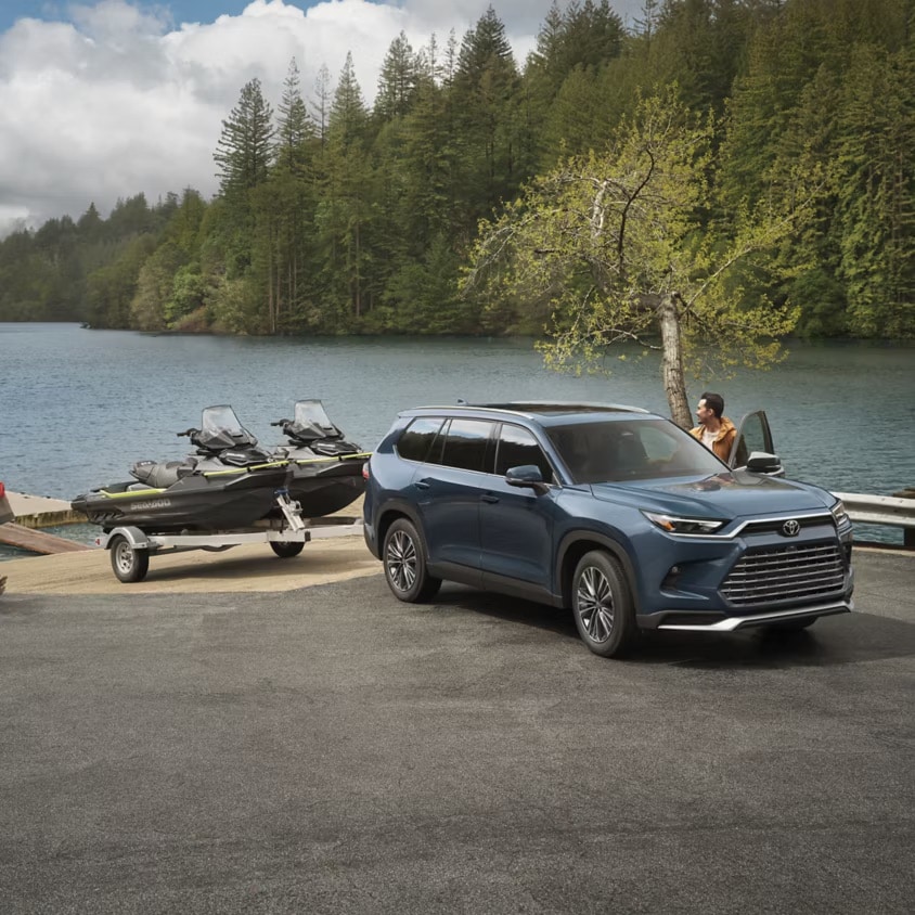  Person cheerfully signing documents.