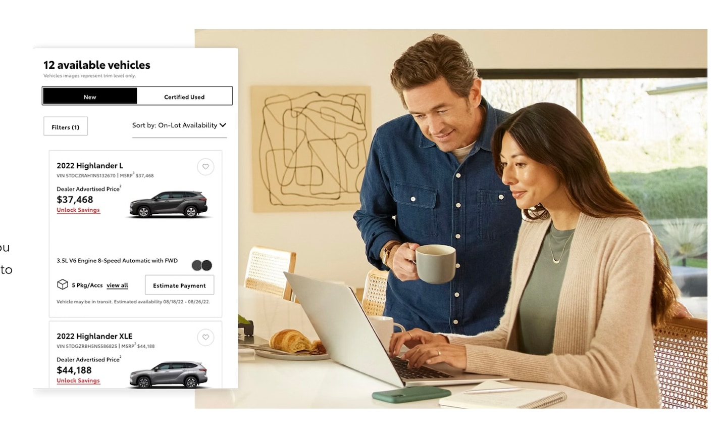  A man and a woman shopping Toyota inventory in Greensboro NC using SmartPath 