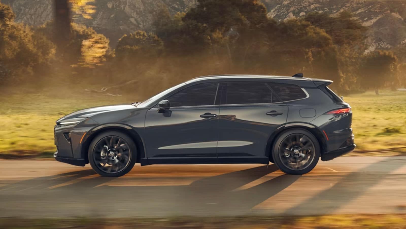  A 2026 Crown Signia driving down the road