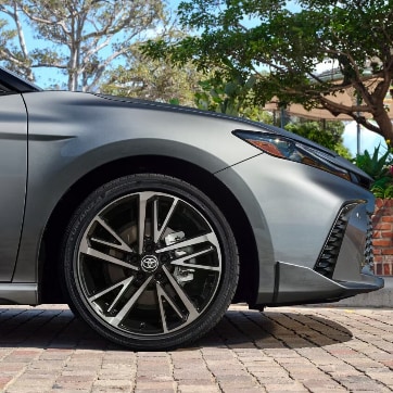  Person cheerfully signing documents.