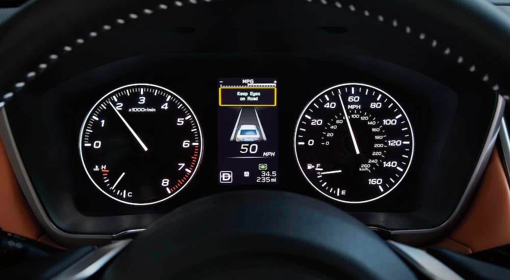 The gauge cluster in a 2021 Subaru Legacy is shown saying keep eys on the road.