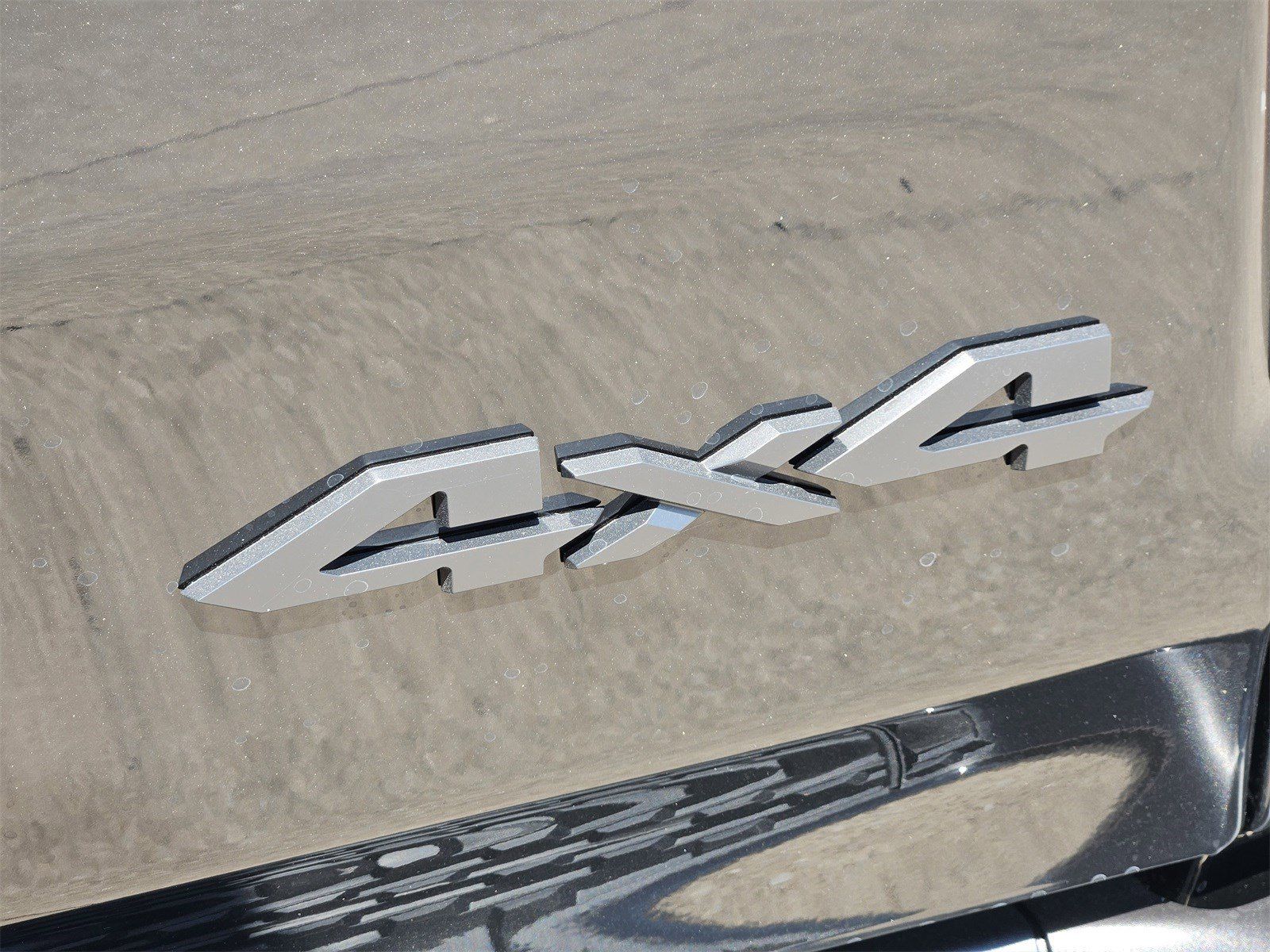 New 2026 Diamond Black Crystal Pearlcoat Ram LONE STAR CREW CAB 4X4 5