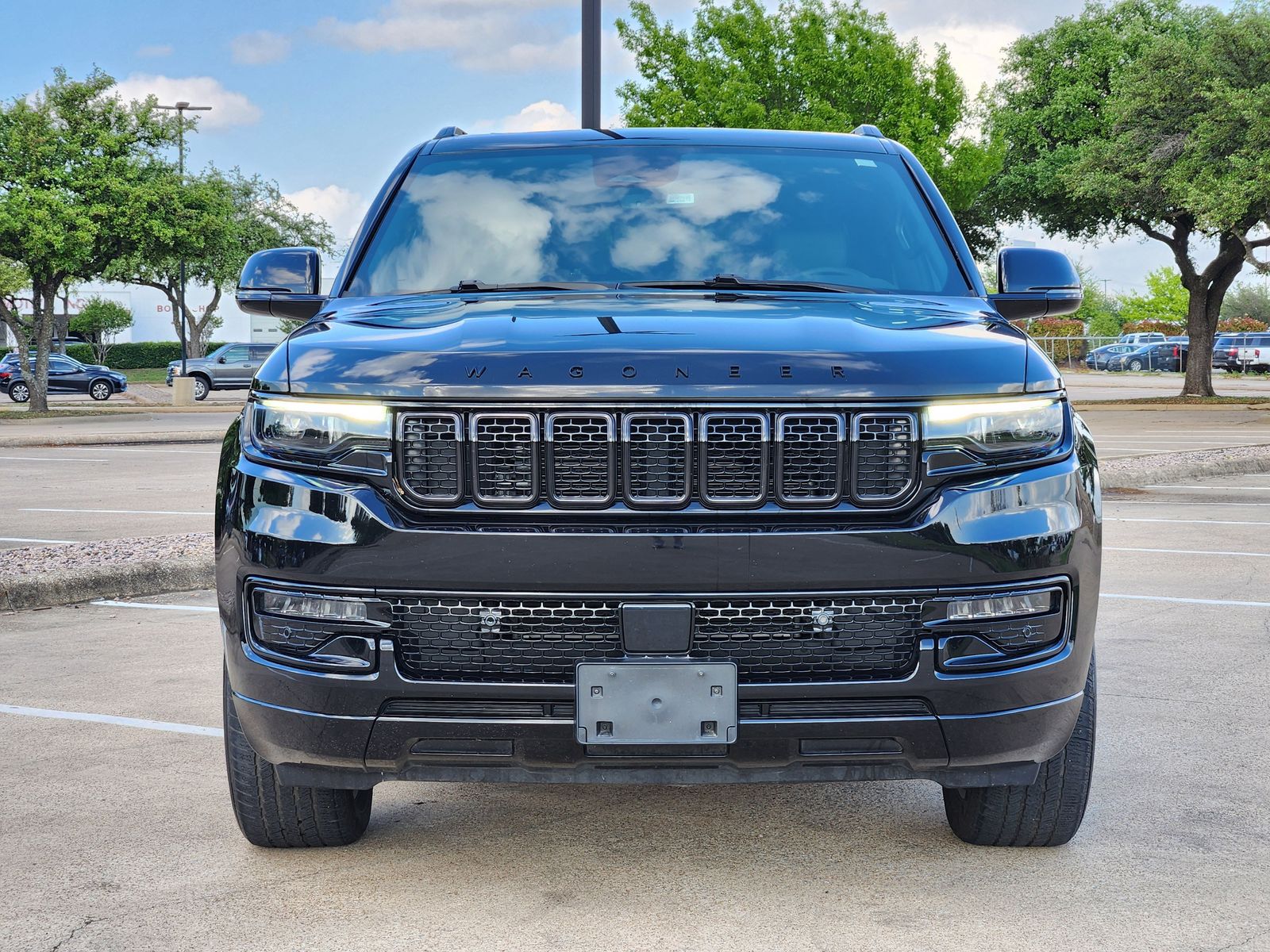 Used 2023 Diamond Black Crystal Pearlcoat Jeep Base image 7