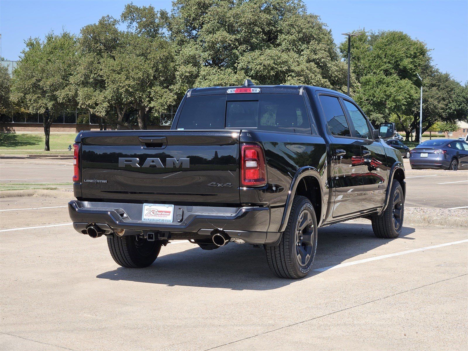 New 2026 Diamond Black Crystal Pearlcoat Ram LONE STAR CREW CAB 4X4 5
