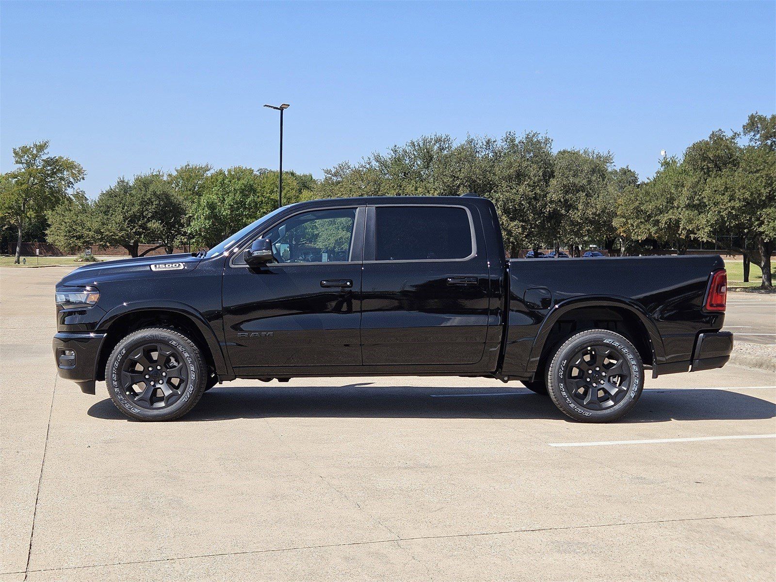 New 2026 Diamond Black Crystal Pearlcoat Ram LONE STAR CREW CAB 4X4 5
