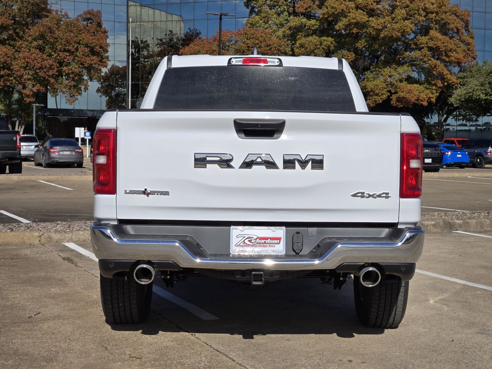 New 2026 Bright White Ram LONE STAR CREW CAB 4X4 5