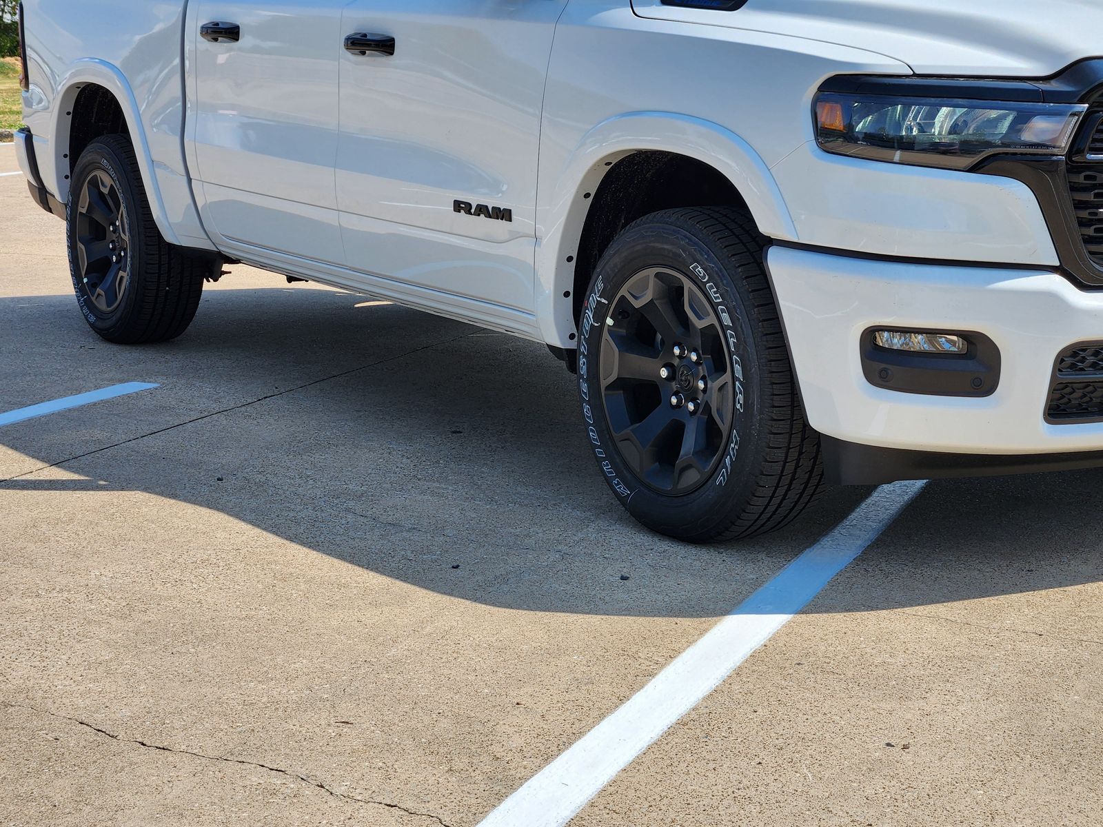 New 2026 Bright White Ram LONE STAR CREW CAB 4X2 5