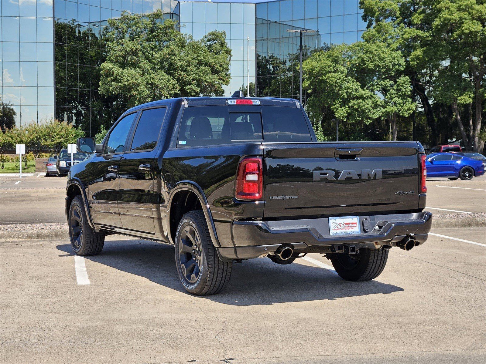 New 2026 Diamond Black Crystal Pearlcoat Ram LONE STAR CREW CAB 4X4 5