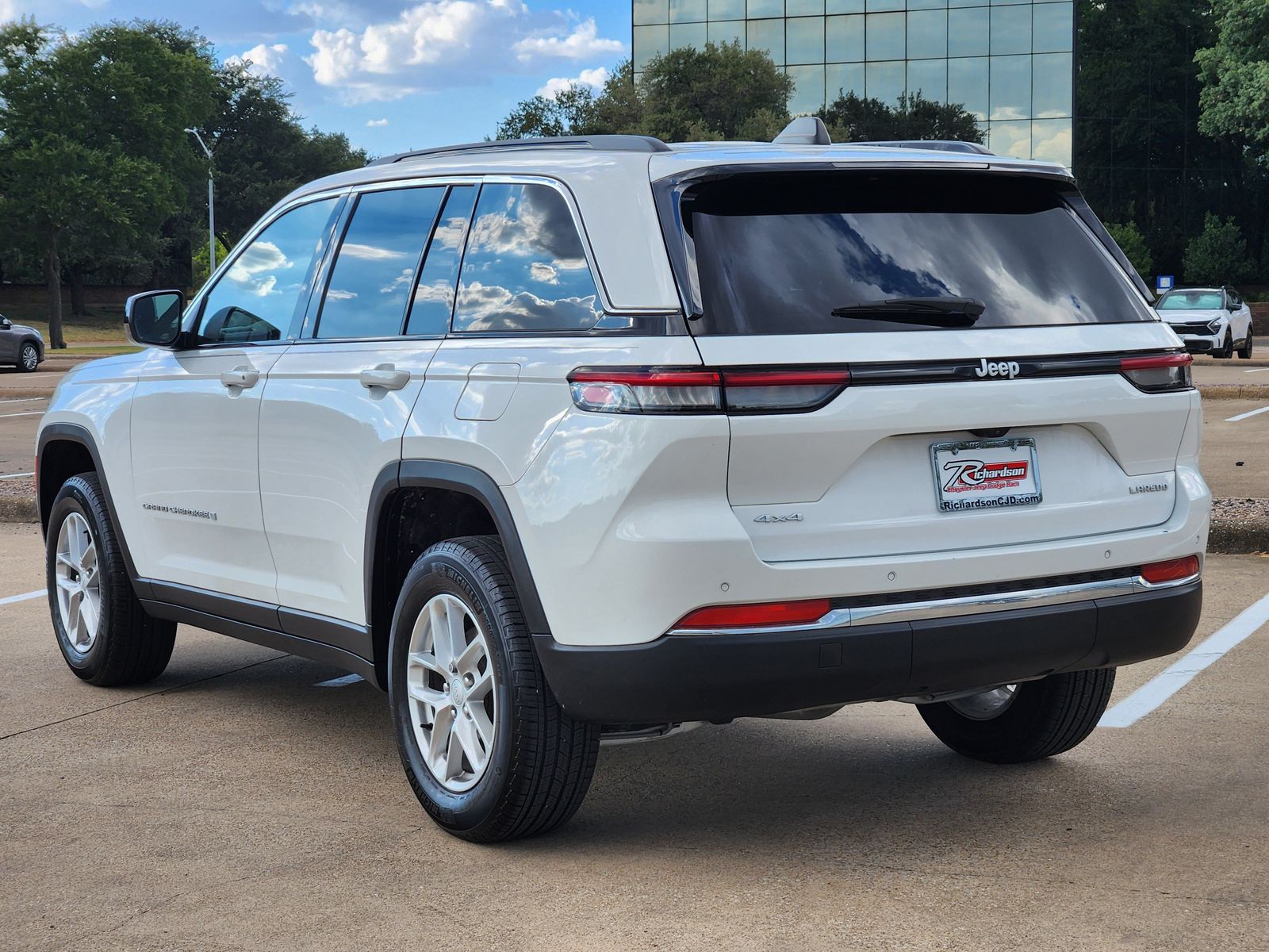 Used 2024 Bright White Clearcoat Jeep Laredo image 4