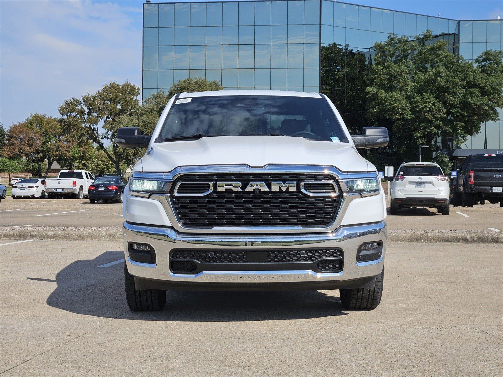 New 2026 Bright White Ram LONE STAR CREW CAB 4X4 5