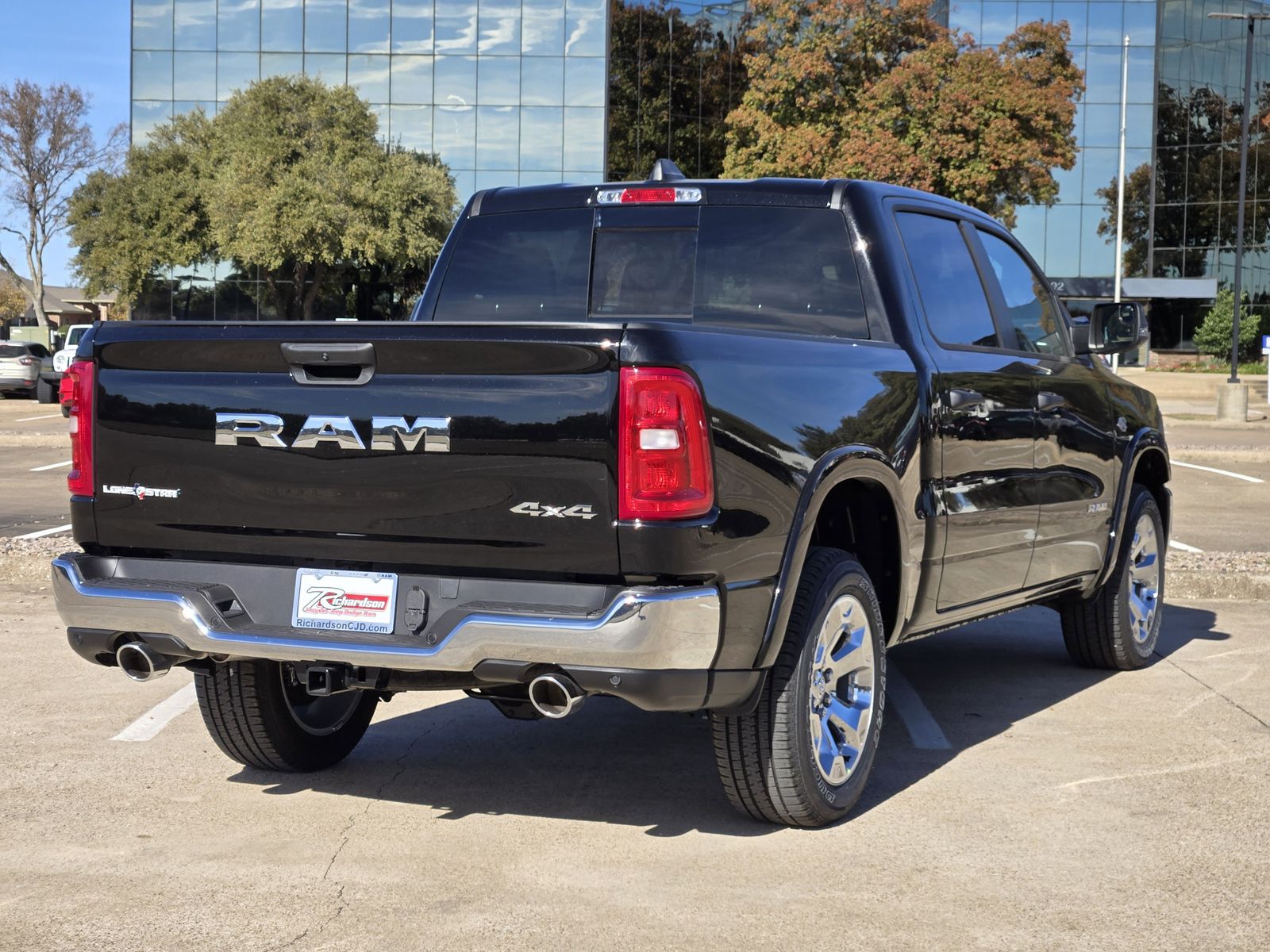 New 2026 Diamond Black Crystal Pearlcoat Ram LONE STAR CREW CAB 4X4 5