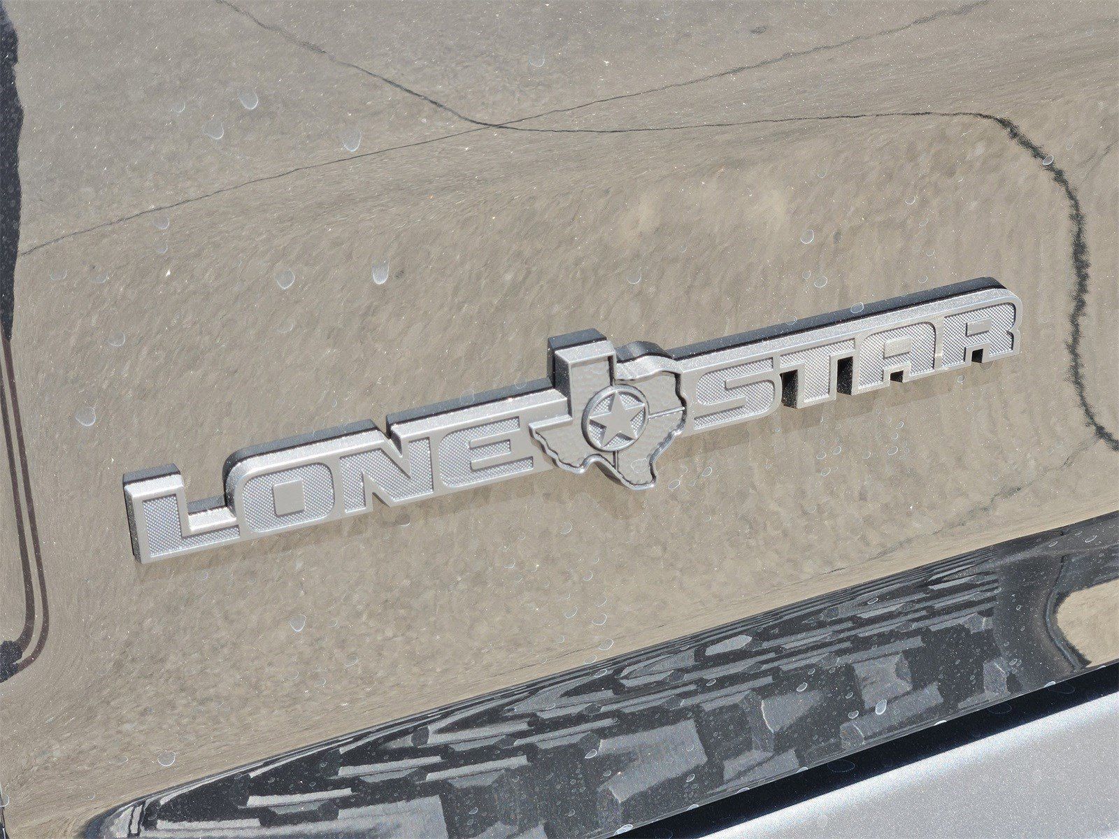 New 2026 Diamond Black Crystal Pearlcoat Ram LONE STAR CREW CAB 4X4 5