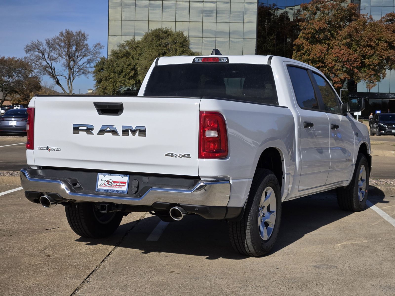 New 2026 Bright White Ram LONE STAR CREW CAB 4X4 5