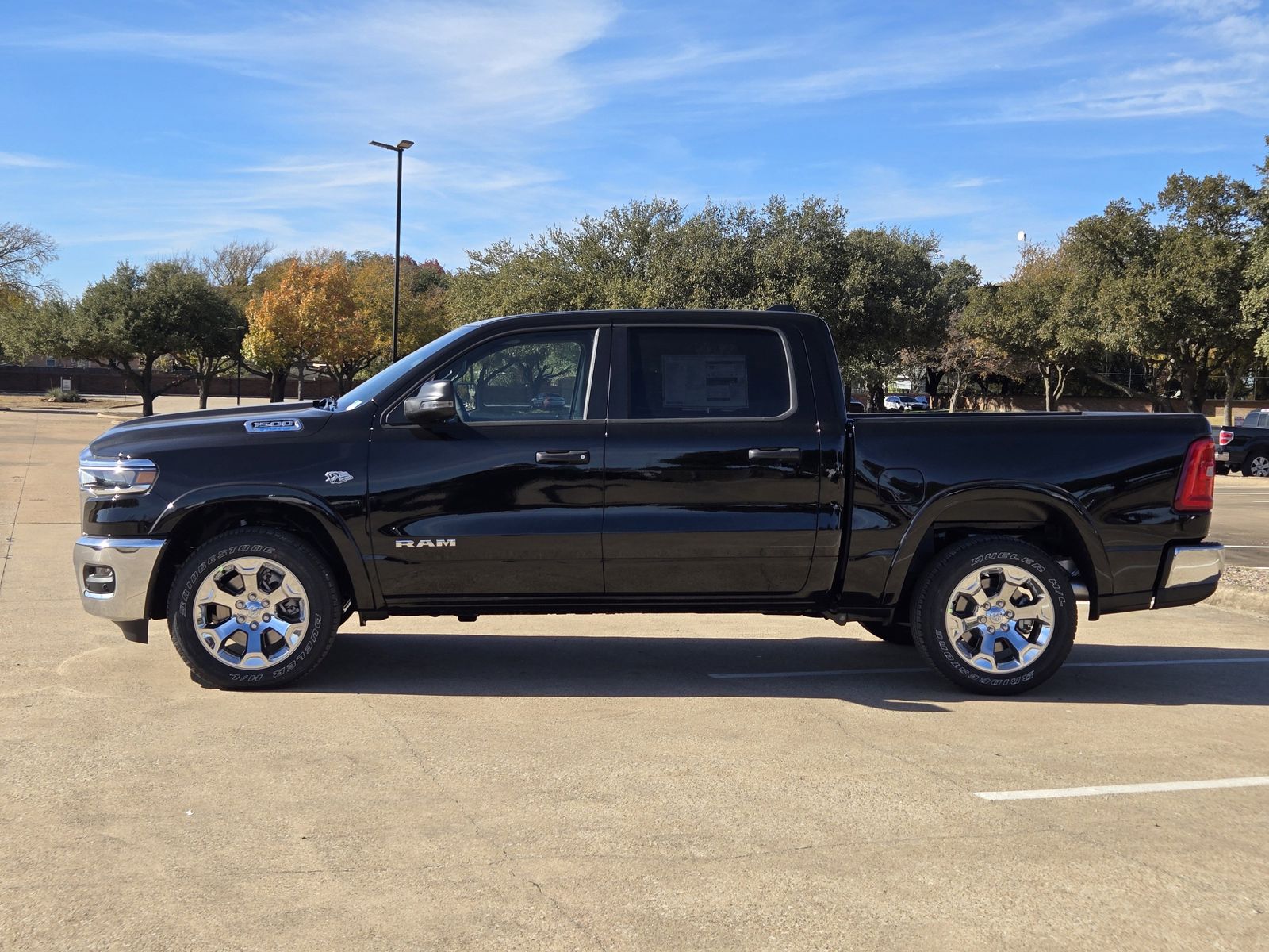 New 2026 Diamond Black Crystal Pearlcoat Ram LONE STAR CREW CAB 4X4 5