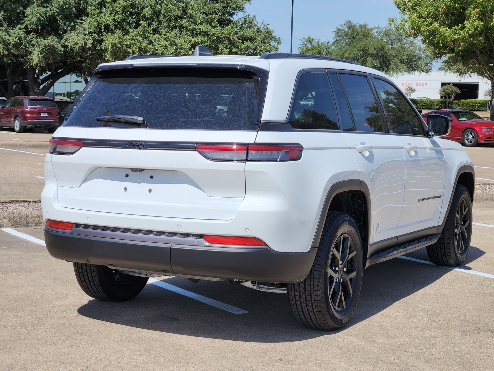New 2026 Bright White Jeep LAREDO ALTITUDE 4X2 image 6