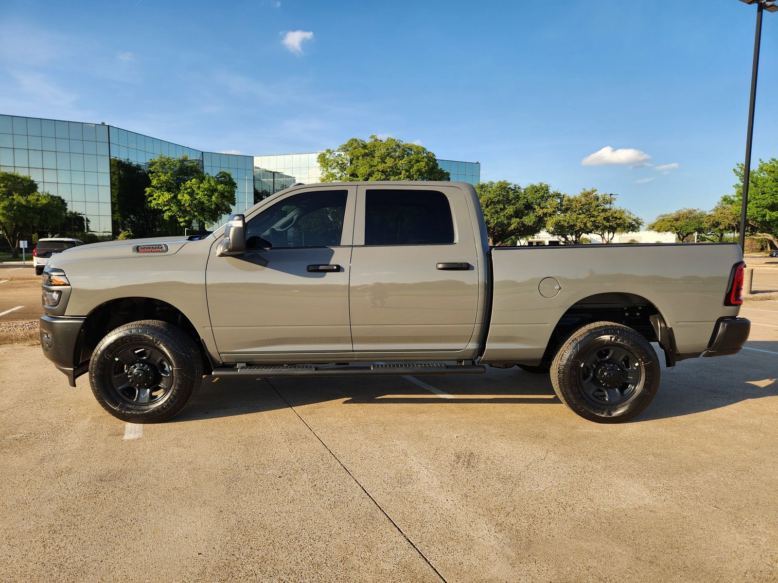 New 2026 Ceramic Gray Ram TRADESMAN CREW CAB 4X4 6