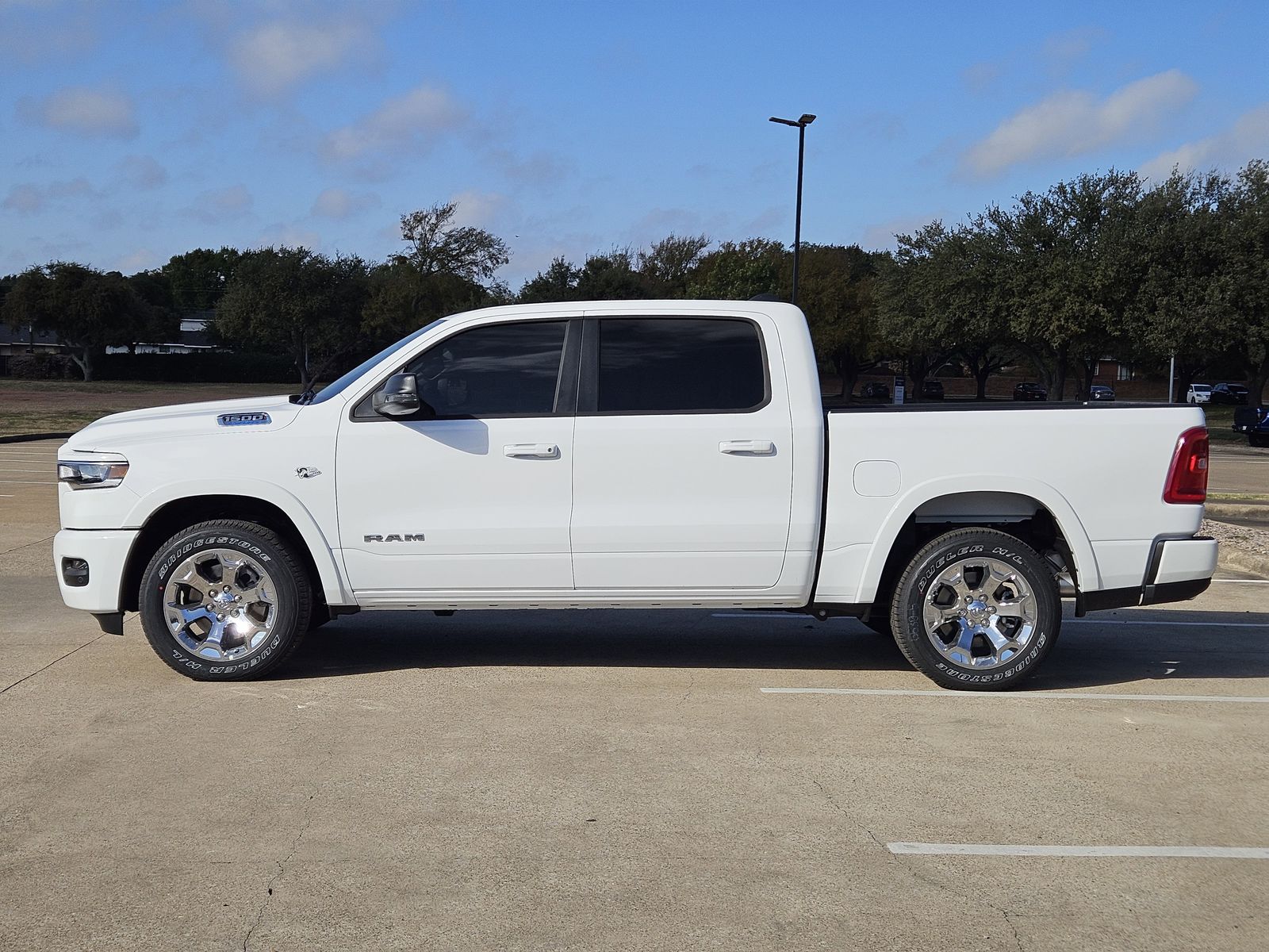 New 2026 Bright White Ram LONE STAR CREW CAB 4X4 5