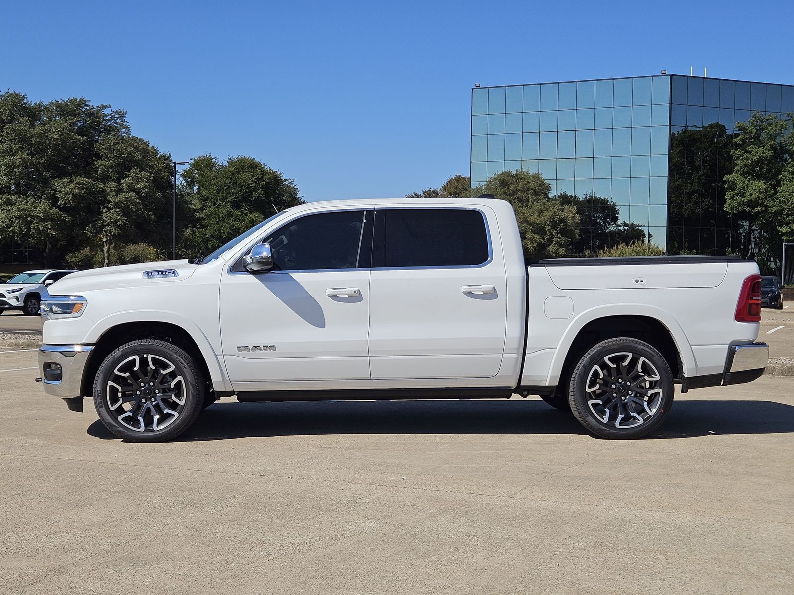 New 2026 Ivory White Tri-Coat Pearlcoat Ram LIMITED LONGHORN CREW CAB 4X4 5