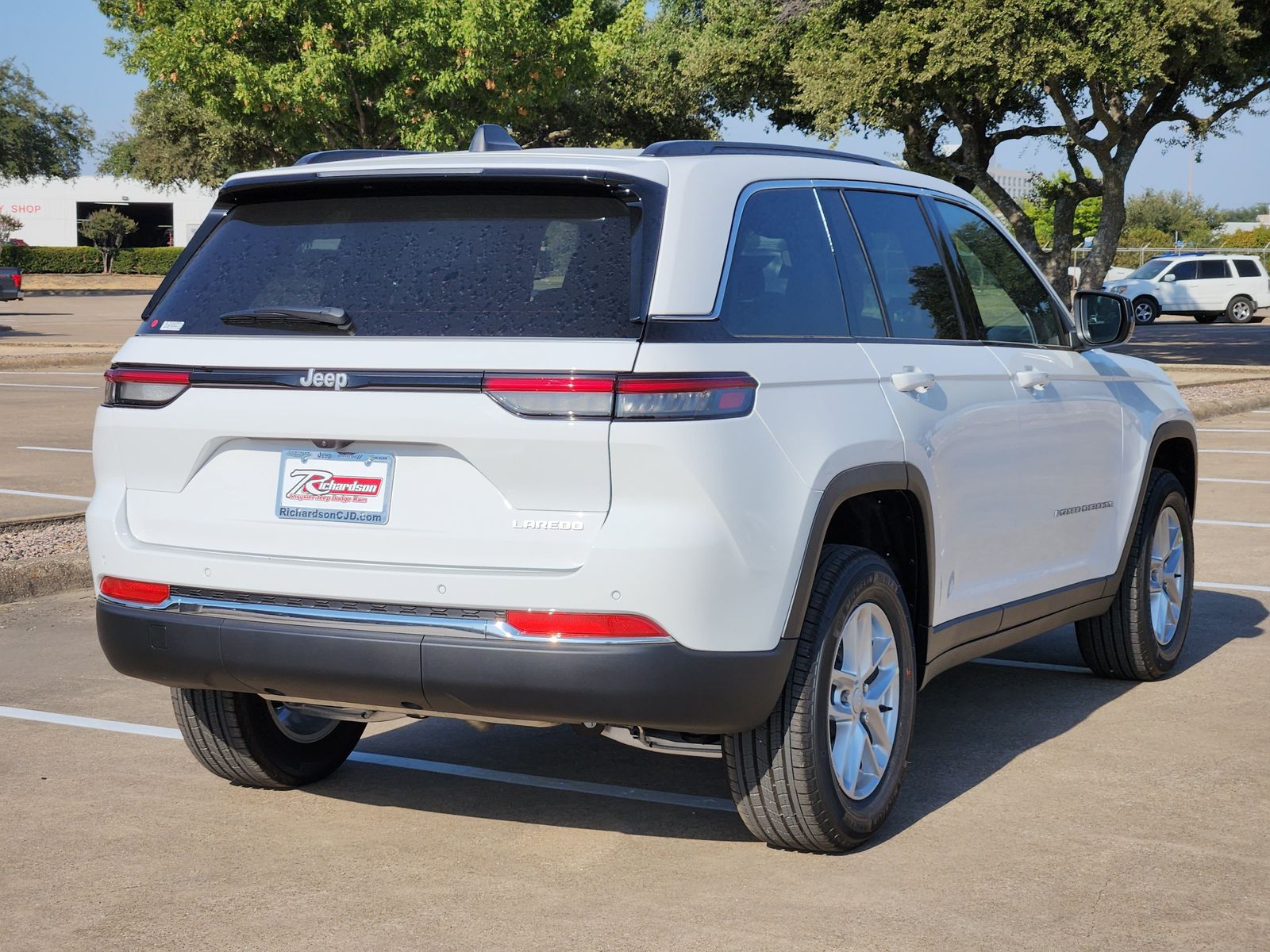 New 2026 Bright White Jeep LAREDO 4X2 image 6