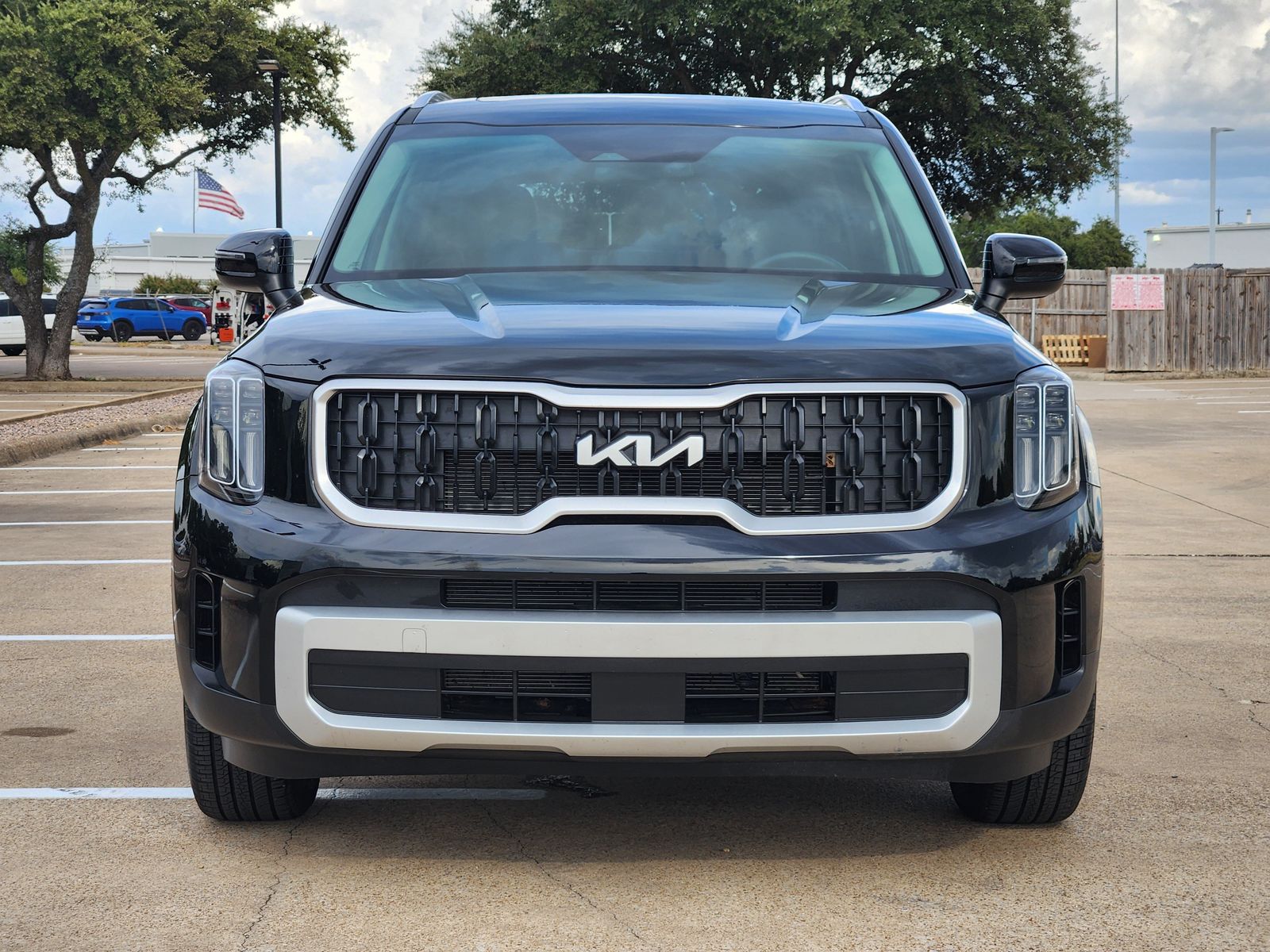 Used 2025 Ebony Black Kia EX image 7