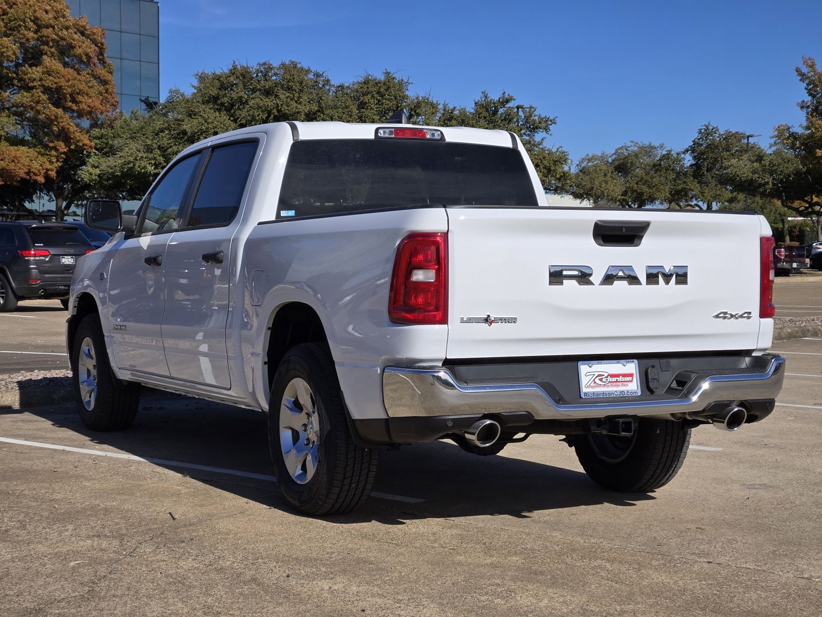 New 2026 Bright White Ram LONE STAR CREW CAB 4X4 5